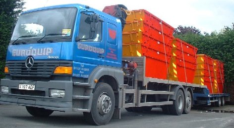 Lorry loaded with skips